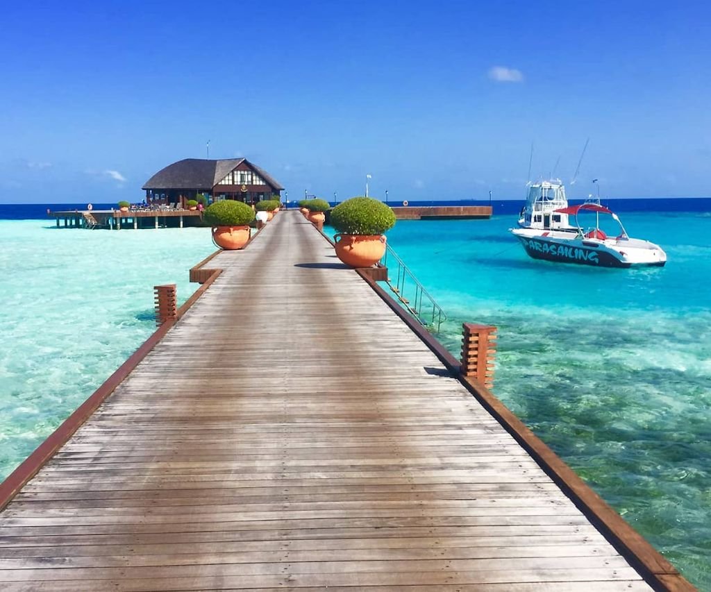 Maldives resort jetty over turquoise water
